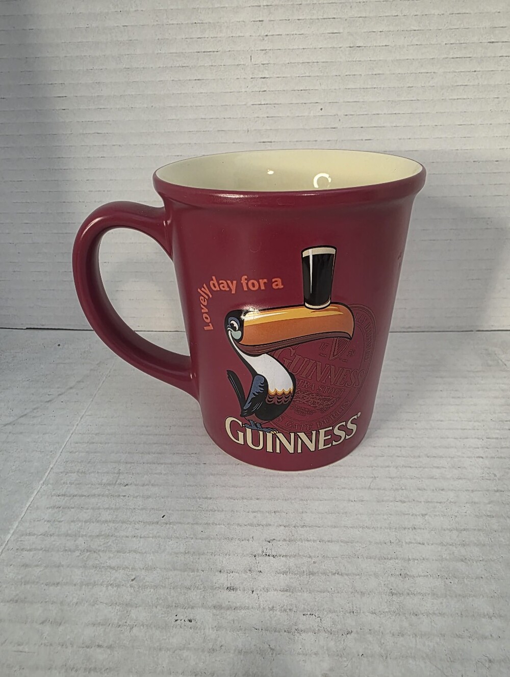 Guinness Collectible Red Ceramic Coffee Mug - Toucan “Lovely Day for a Guinness